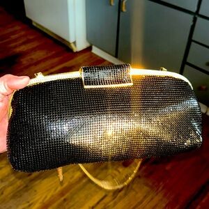Vintage black and gold sequin clutch with a long gold shoulder chain.